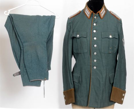 POLIZEI - GENDARMERIE OFFICER'S SERVICE UNIFORM (REVIER/OBERMEISTER)  Police green wool rayon blend construction tunic with t