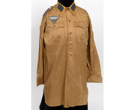 NATIONAL SOZIALISTISCHE FLIEGERKORPS (NSFK) -  ENLISTED MANS BROWN SHIRT  of tan cotton twill construction with a three butto