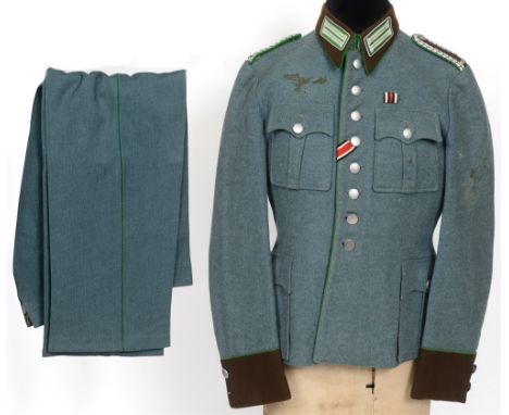 POLIZEI - SCHUTZPOLIZEI 'OBERWACHMEISTER' SERVICE UNIFORM  Police green wool construction tunic with two pleated patch breast