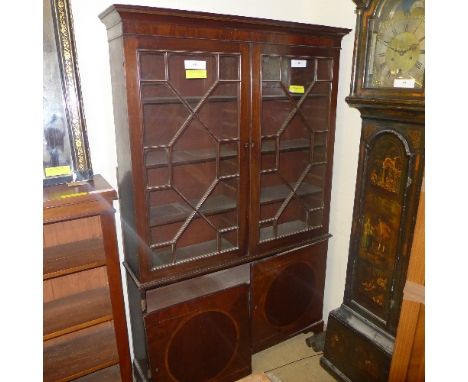 A Georgian design mahogany bookcase/display cabinet with glazed panel doors on bracket feet 194 x 125