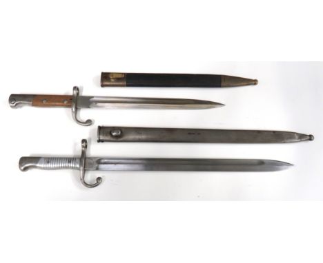 Two German Made Contract South American Bayonetsconsisting Argentine M1891.   15 3/4 inch, single edged blade with fuller.   
