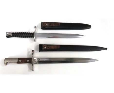 Two Swiss Issue Bayonetsconsisting M1918 Schmidt Rubin example.   11 3/4 inch, double edged blade.   Forte marked "Waffenfabr