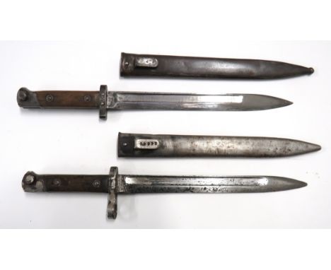Two Austrian M1895 Mannlicher Bayonets9 3/4 inch, single edged blades with fullers.   Forte marked "Ernst Busch. Solingen".  
