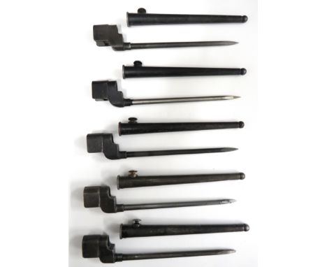 Five British No 4 MK2* Spike Bayonets8 inch, spike blade with step at the forte.   Blackened sockets, all with various stamps