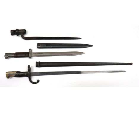 Three Various Bayonetsconsisting French M1874 Gras bayonet.   20 1/2 inch, T section blade.   Back edge with maker dated "188