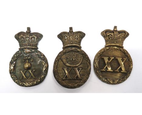 Three Other Ranks 20th Albert Shako Helmet Platesconsisting brass, Vic crown over laurel wreath circlet and central XX ... Si