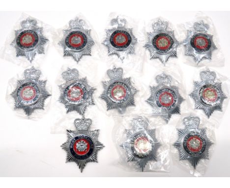 13 x Obsolete West Yorkshire Police helmet plateschrome, gilt and enamel, QC helmet plates.   Rear screw fitting.   13 items.