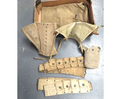 Selection Of American WW1 & WW2 Equipmentconsisting khaki webbing, 9 pouch ammunition belt dated 7-18 ... Similar later, 10 p