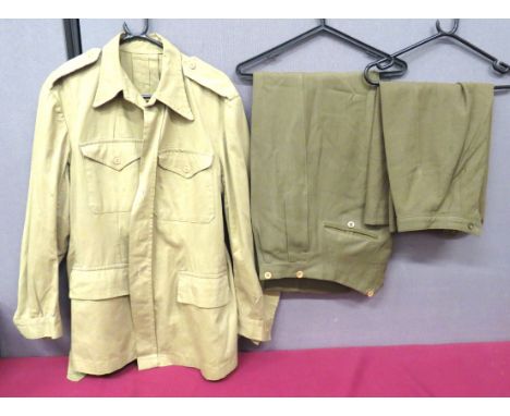 Small Selection Of Uniform Itemsconsisting WW2 khaki drill, single breasted, bush jacket.   Patch chest pockets with buttoned