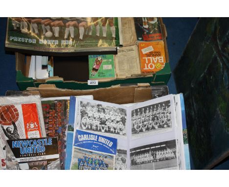 Two boxes of vintage football memorabilia.