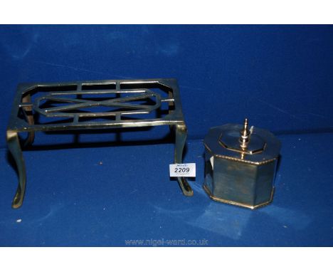 An early 20th c. rectangular brass Trivet 9 1/2" long plus an interesting 19th c. eight sided brass tea caddy with rope twist