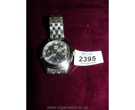 A stainless steel cased and wristlet gents automatic wristwatch having grey face with sweep second hand inset 24 hour, month 