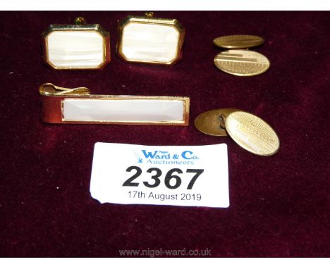 A pair of rolled gold cufflinks, cufflinks and tie pin set.