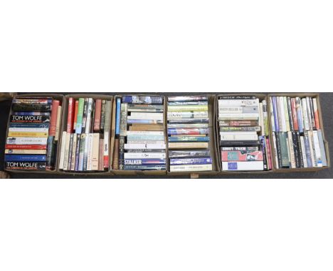 ° ° A large collection of modern first editions and literature, including books by Jeffrey Archer, John Braine, Richard Burns