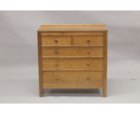 ROBERT "MOUSEMAN" THOMPSON. AN OAK  CHEST OF DRAWERS, with adzed rectangular top, panelled ends, two short and three long gra