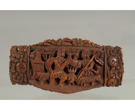 AN 18TH CENTURY CARVED AND PIERCED SNUFF BOX. 3.25ins long. 