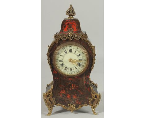 A 19TH CENTURY BOULLE CLOCK 12ins high.