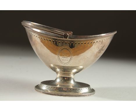 A GEORGE III SILVER BOAT SHAPED SUGAR BASIN with bead edge. London 1786.  Maker: J. H.