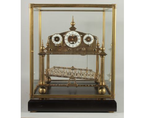 A MOONPHASE CONGREAVE CLOCK in a glass case. 15ins high.