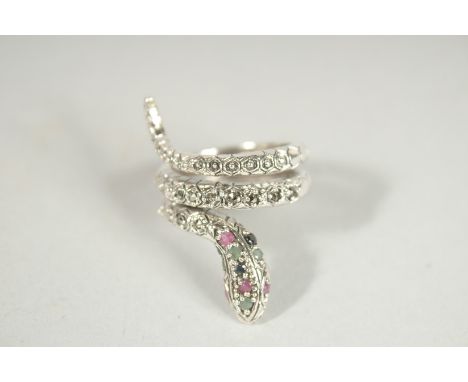 A SILVER RUBY, SAP;HIRE AND EMERALD SNAKE RING.