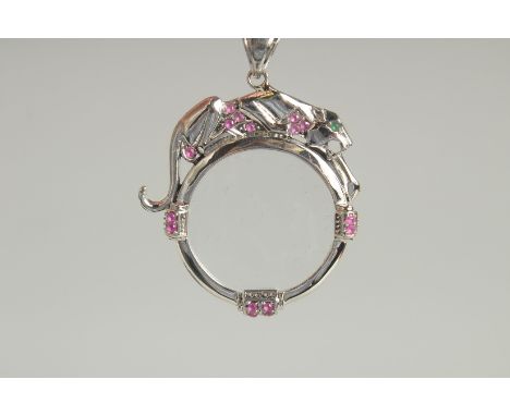 AN ART DECO DESIGN SILVER AND RUBY SET PANETHER LOUPE AND CHAIN.