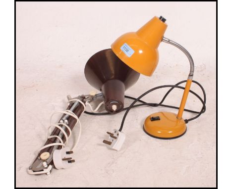 A retro 1980's yellow goose neck anglepoise desk lamp together with a Herbert Terry style desk fixing anglepoise lamp