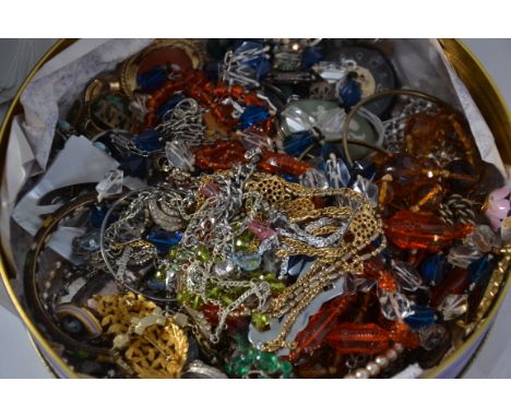 A collection of assorted vintage costume jewellery to include earrings, bracelets, bangles etc. Some white metal, some yellow