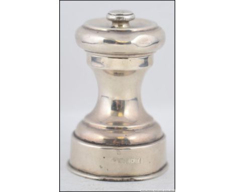A silver hallmarked grinder - condiment having rubbed makers marks bearing BIrmingham hallmarks for 1926. Total weight 120.7g