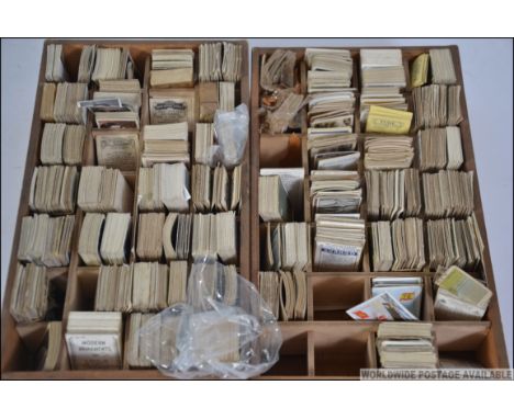 CIGARETTE CARDS: An interesting collection of vintage and some early assorted cigarette cards (x2 trays) all sorted into part