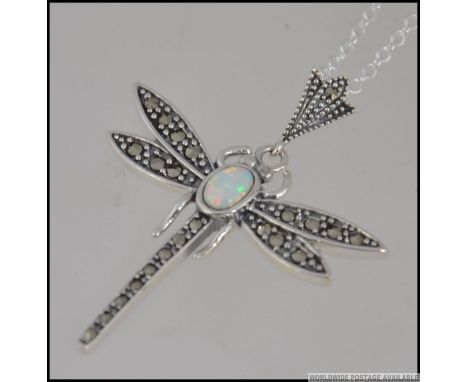 A 925 white metal silver marcasite and opal dragon fly pendant necklace