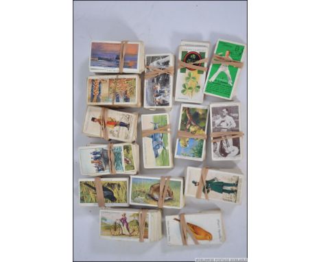 Mixed lot of John Player vintage cigarette cards to include full sets,,Animals of the countryside , military uniform of the B