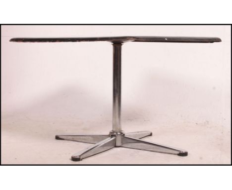 A retro enamel topped occasional / coffee table having a white tiled effect top raised on a revolving chrome pedestal support