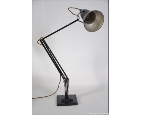 A mid century Industrial Herbert Terry anglepoise desk lamp raised on a twin step square terraced base with pendant shade bei