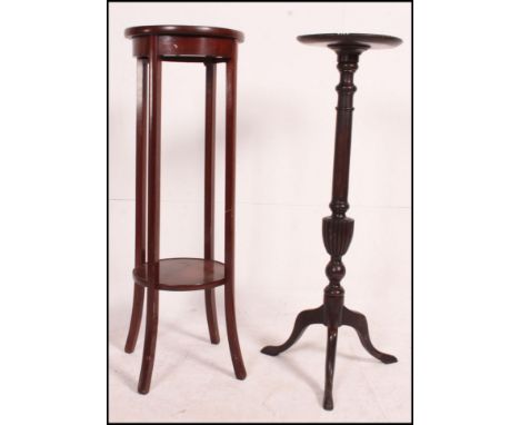 A Victoria pedestal tripod torchere plant stand together with an Edwardian mahogany torchere - jardiniere stand. Measures(cm)