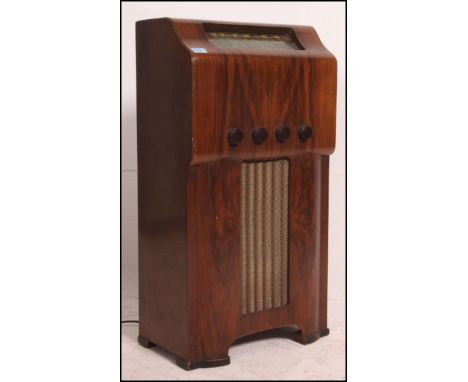 A stunning 1930's Art Deco Defiant radio receiver pedestal cabinet finished in a walnut veneer with glass panel to the top an