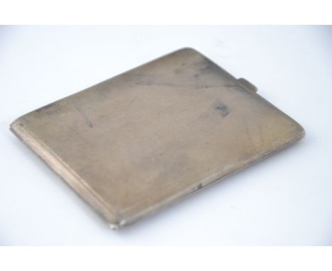 A silver hallmarked engine turned hallmarked cigarette case, having assay mark for Birmingham, makers mark for Charles S Gree