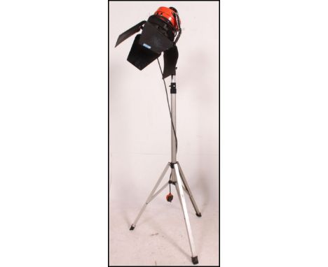 A retro Audio Laniro theatre / stage light complete with barn doors mounted on an adjustable chrome tripod