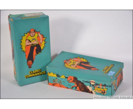 A pair of vintage 1970's ' Clarks Commandos ' vintage shoe advertising boxes. Both with colourful sci-fi themed artwork. Rare