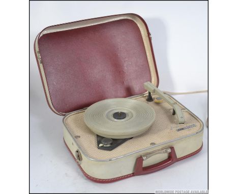 A stunning vintage portable two tone four speed suitcase Fidelity record player in working order