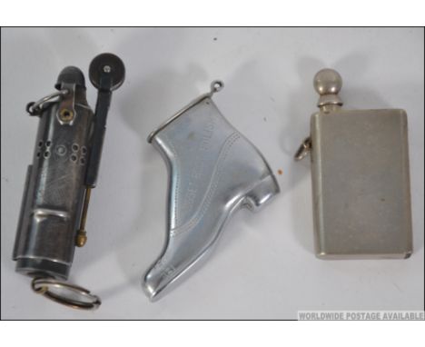 A fabulous WWI Bowers Sure Fire Cigarette Lighter  together with a 
Nugget Boot Polish cigarette lighter and a strike lighter