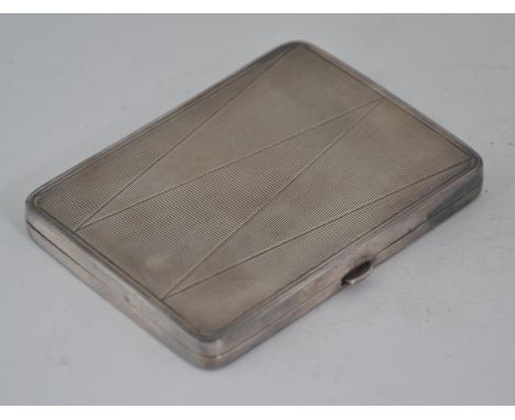 An Art Deco silver hallmarked cigarette case with stunning engine turned geometric lined case ( complete with the leather sle