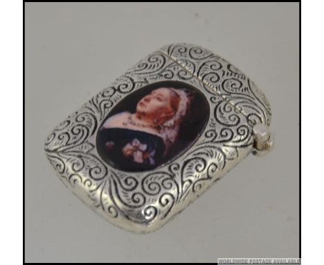 A silver plated vesta case with enamel images of Victoria & Albert to both sides.  Measures: 3cms high. total weight 20g