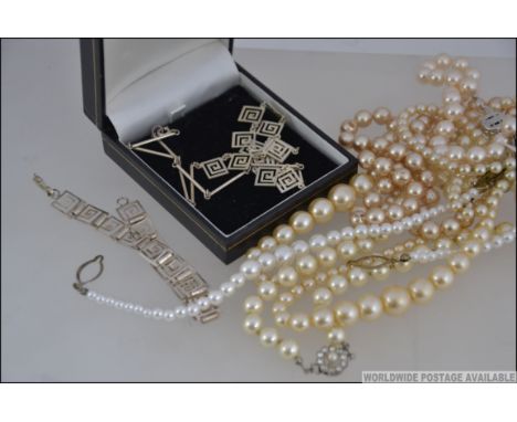 A white metal necklace and bracelet set , stamped 925 , featuring the Greek key , Costume jewellery to include 3 pearl style 