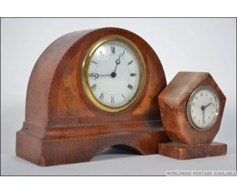 An Edwardian mahogany inlaid mantel clock together with another in a marble case of diamond form 17cms high
