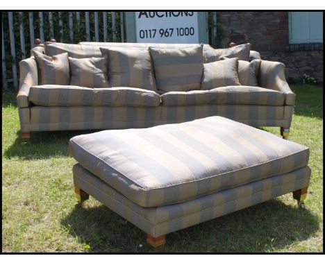 A stunning large Duresta sofa settee and oversized ottoman footrest pouffe having Knoll type back being raised on square tape