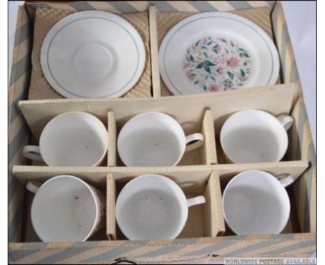 A good retro boxed unused bone china tea service from 1972 by Ridgway in the Kismet pattern, comprising of six cups, six sauc