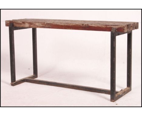 A 20th century Industrial and wooden slatted bench - likely from and old Lido - Swimming pool changing rooms. Measures: 48cm 