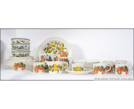 A collection of Portmeirion ceramics to include Oranges & Lemons set: Plates, cups, saucers, dishes, bowls, milk jug, creamer