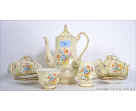 A stunning 1930's Art Deco Paragon ' Salon ' registered tea service comprising teapot, cups, saucers, plates, sugar bowl and 