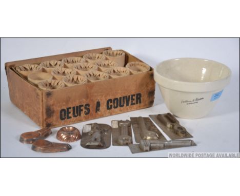 A collection of vintage kitchenalia to include a Fortnum and Mason pudding bowl, a vintage cardboard Oeufs A Couver ( French 